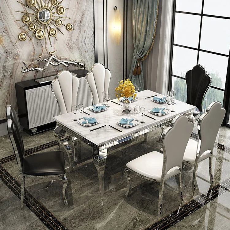 Elegant light luxury style dining table set by MC THE BLACK DIAMOND, showcasing a modern home decor with sleek table and matching chairs.