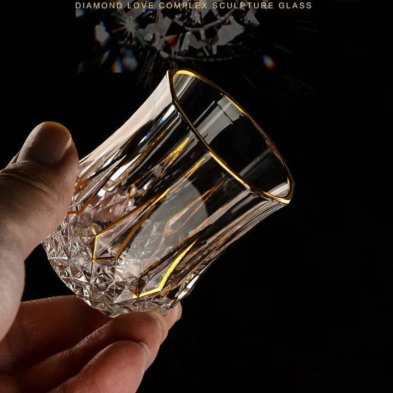 Elegant glass gold crystal red cup from MC THE BLACK DIAMOND drinkware set, showcasing a luxurious design and vibrant red color.