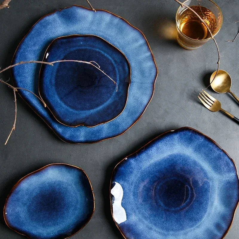 Elegant luxury dinnerware set from MC THE BLACK DIAMOND featuring sleek plates and bowls for sophisticated dining.
