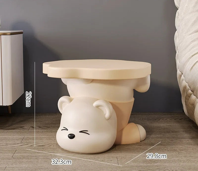 Cartoon household shoe cabinet used as a side table by MC THE BLACK DIAMOND, showing multiple compartments and a playful design.