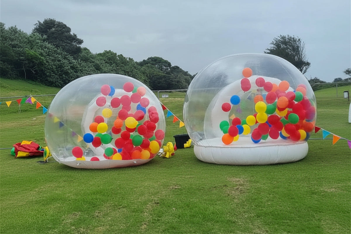 Transparent inflatable crystal dome bubble room for kids, large inflatable bouncer by MC THE BLACK DIAMOND, with clear walls and playful interior.