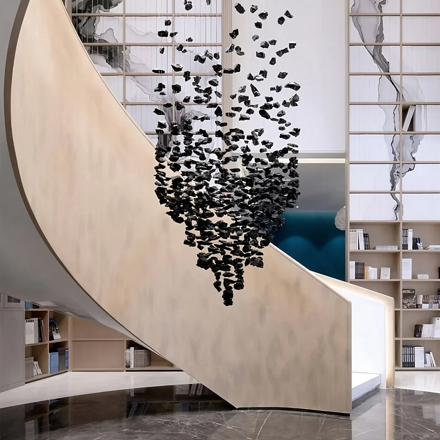 Large MC THE BLACK DIAMOND modern stone crystal LED chandelier hanging in a luxurious staircase and living room setting.