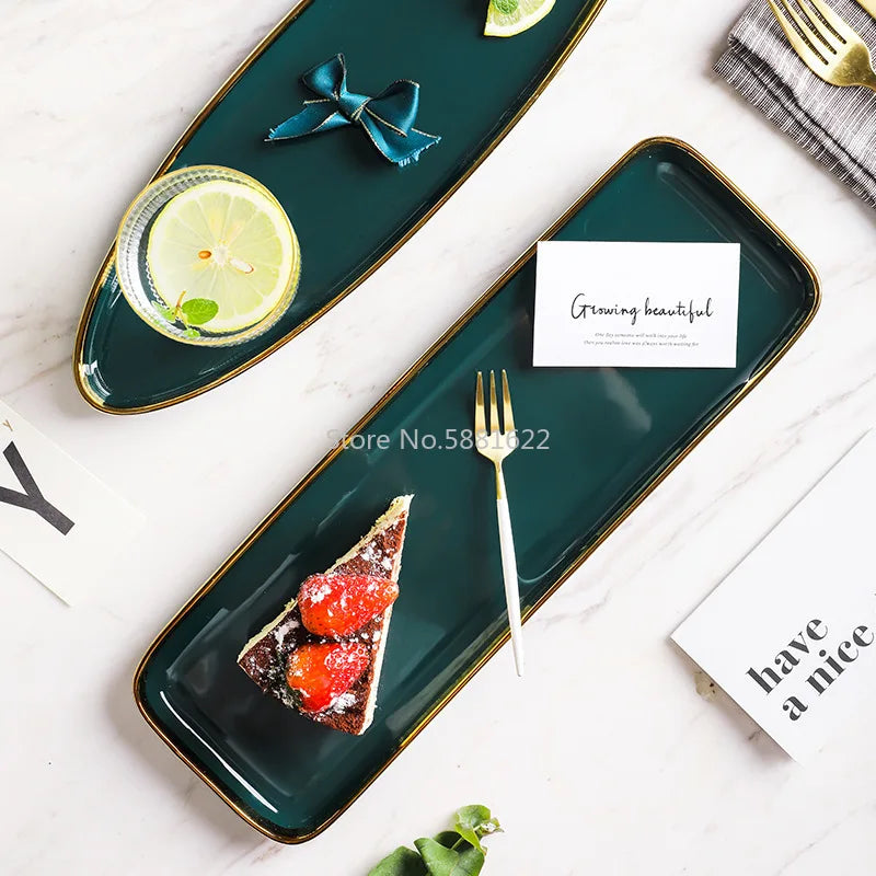 Green ceramic dinnerware set with gold inlay, including dessert plates, salad bowls, and rice bowls from 𝕄𝕔 𝕋𝕙𝕖 𝔹𝕝𝕒𝕔𝕜 𝔻�