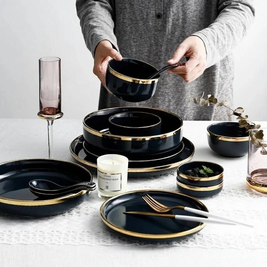 Pink black gold inlay ceramic dinnerware set by MC THE BLACK DIAMOND, featuring elegant plates and bowls with intricate gold designs.