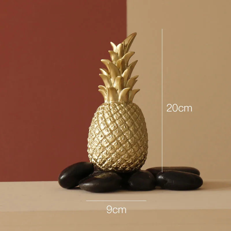 Golden ceramic pineapple home decor by MC THE BLACK DIAMOND, decorative piece for living rooms, porches, and wedding gifts.