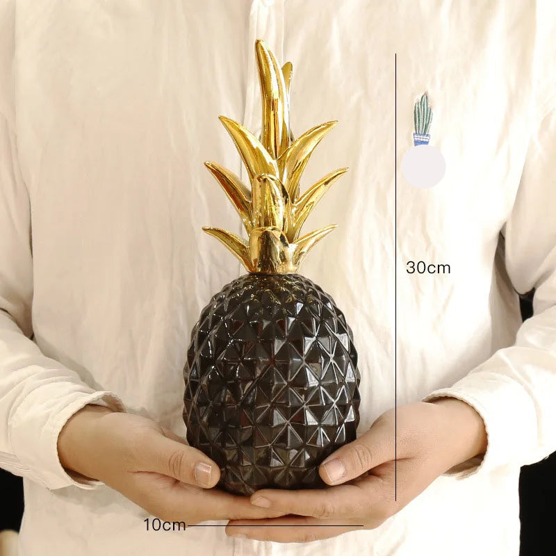 Gold ceramic pineapple home decor by MC THE BLACK DIAMOND, decorative piece for living room, porch, or wedding gift.