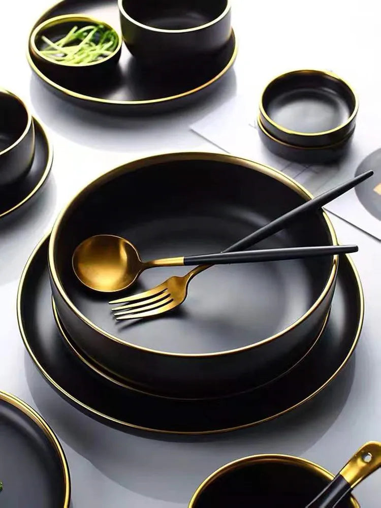 Set of black porcelain dinner plates and bowls with cutlery from 𝕄𝕔 𝕋𝕙𝕖 𝔹𝕝𝕒𝕔𝕜 𝔻𝕚𝕒𝕞�