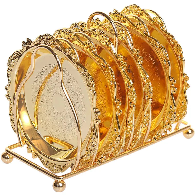Golden metal cocktail coaster featuring classical design by MC THE BLACK DIAMOND, perfect for elegant beverage presentation.