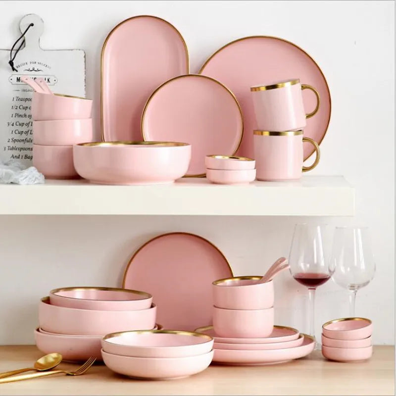 Family size dinnerware set in pink color by MC THE BLACK DIAMOND, featuring plates, bowls, and cups for a complete dining set.