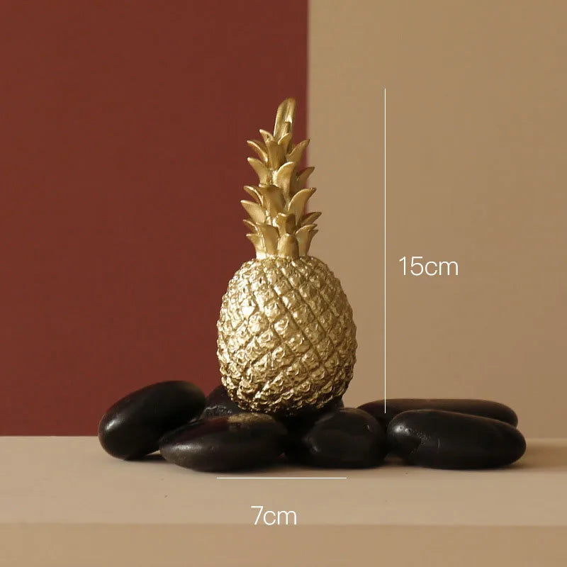 Golden ceramic pineapple home decor piece by MC THE BLACK DIAMOND, ideal for living room, porch, or wedding decoration.