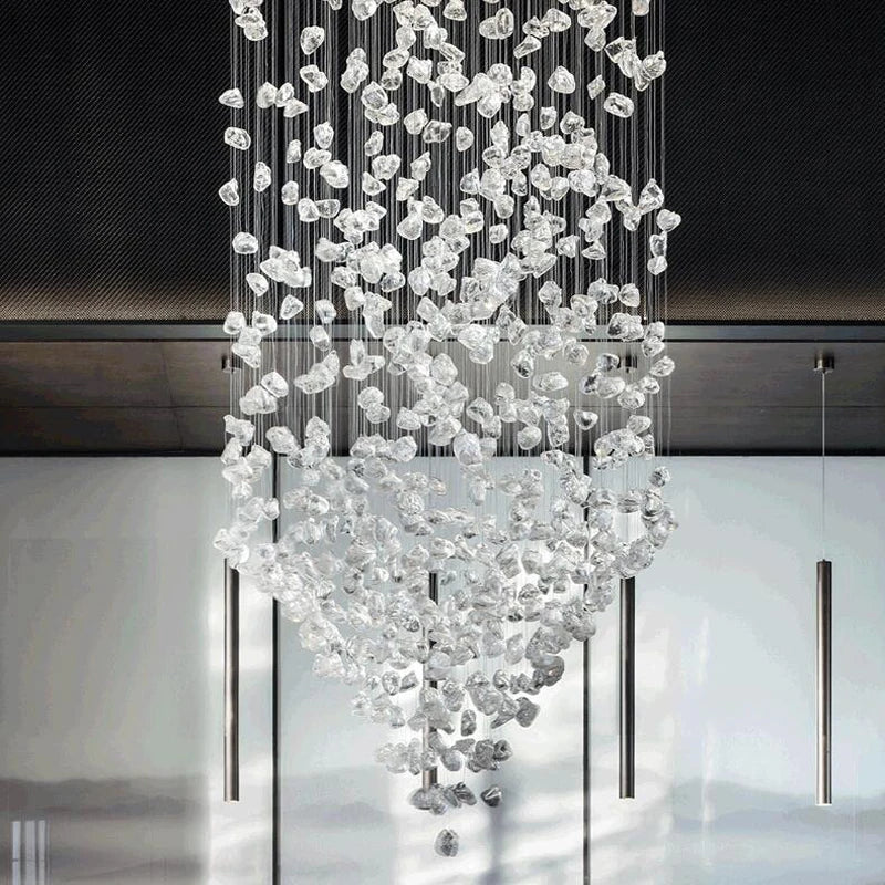 Modern stone crystal LED chandelier by MC THE BLACK DIAMOND, large luxury staircase and living room light fixture with intricate design.