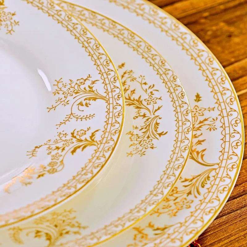 Family-size Royal Dinnerware Set by MC THE BLACK DIAMOND, includes plates, bowls, and cups with elegant design.