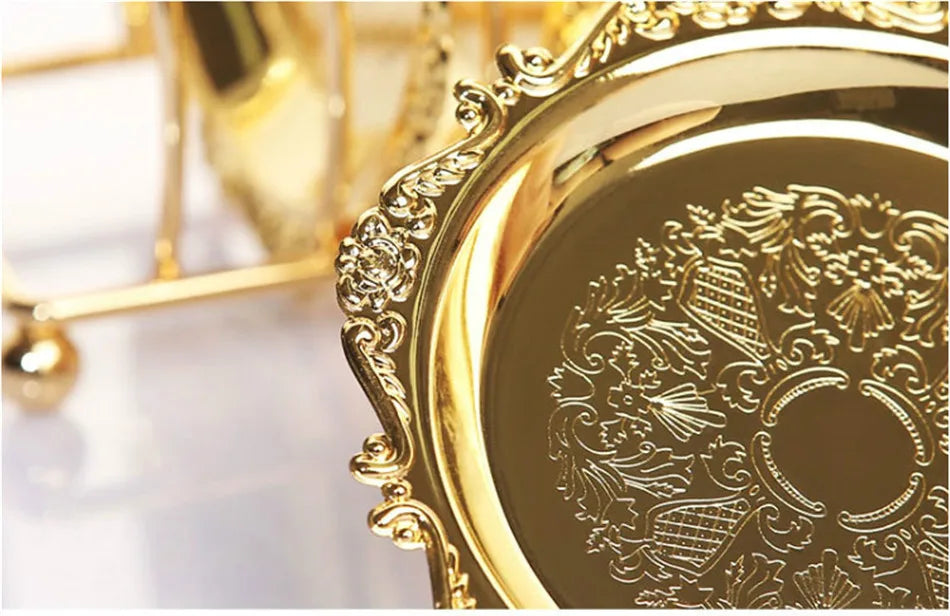 Golden metal cocktail coaster with classical design, perfect for elegant drinks, by MC THE BLACK DIAMOND.