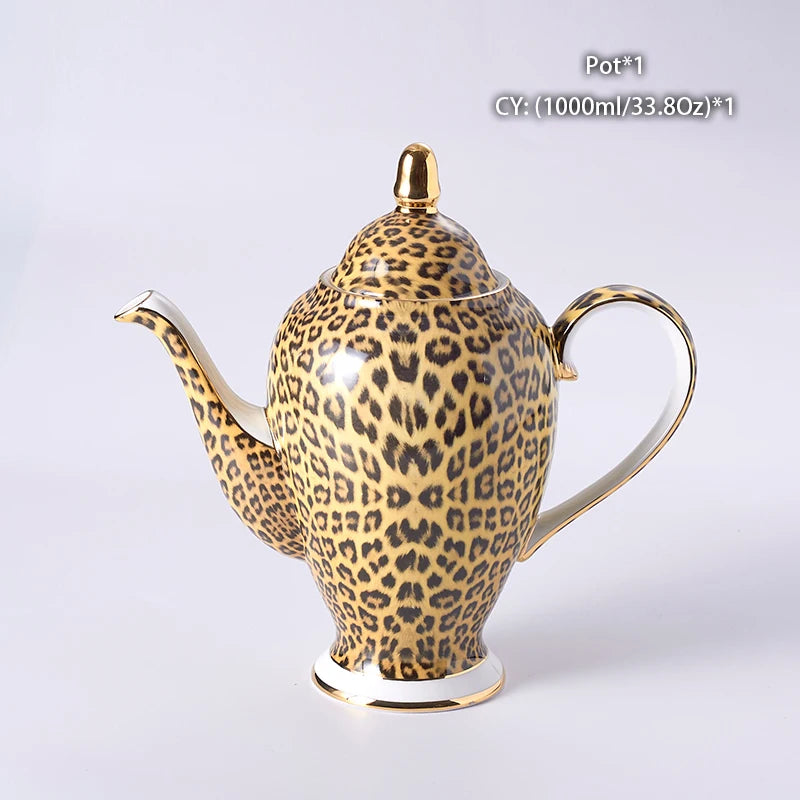 Leopard print bone china coffee set with teapot, cups, sugar bowl, and creamer from 𝕄𝕔 𝕋𝕙𝕖 𝔹𝕝𝕒𝕔𝕜 𝔻𝕚