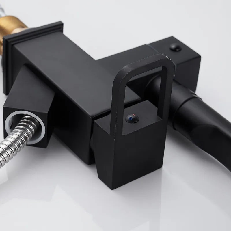 Chrome silver kitchen sink faucet with hot and cold water spring spout by MC THE BLACK DIAMOND.