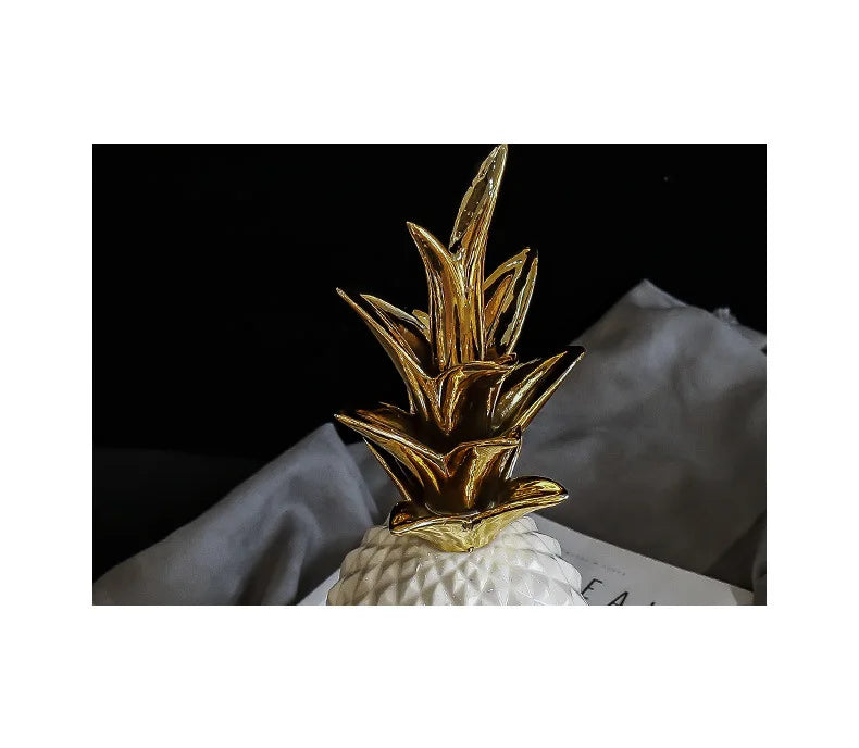 HD image of MC THE BLACK DIAMOND Nordic Light luxury ceramic pineapple home decor with gold finish, perfect for living room or wedding gift.