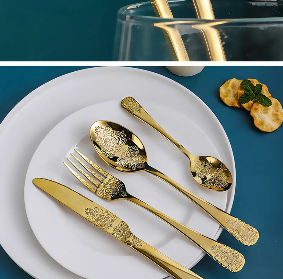 Stainless steel gold flatware set with forks, knives, and spoons from MC THE BLACK DIAMOND, arranged on a table.