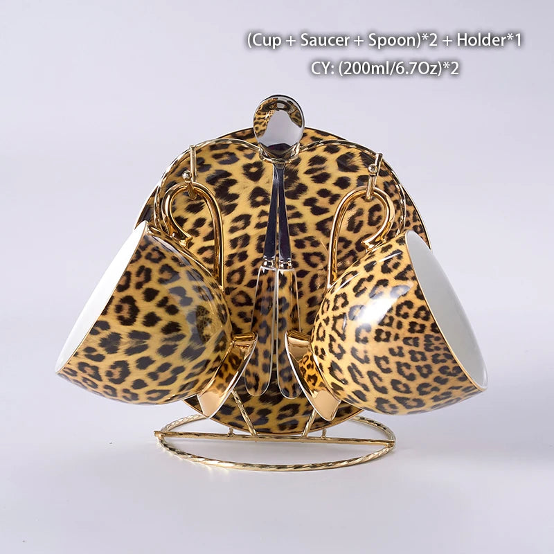 Leopard print bone china coffee set with teapot, cups, sugar bowl, and creamer from 𝕄𝕔 𝕋𝕙𝕖 𝔹𝕝𝕒𝕔𝕜 𝔻𝕚