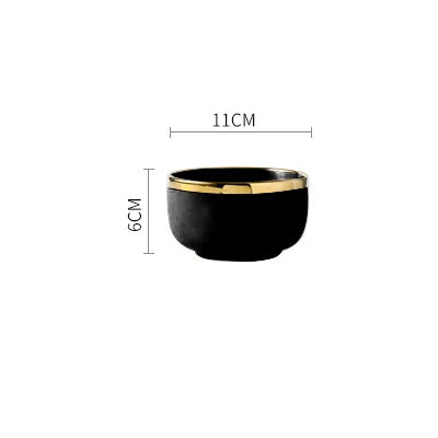 Pink, black, and gold inlay ceramic dinnerware set by MC THE BLACK DIAMOND, featuring elegant plates and bowls for stylish dining.