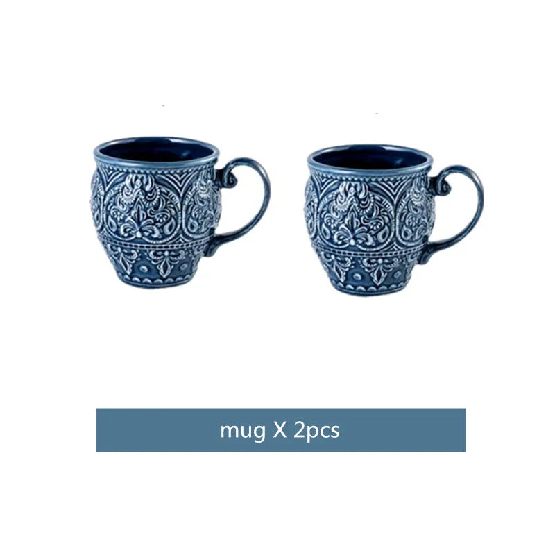 Blue retro relief ceramic dinnerware set with matching plates and bowls from MC THE BLACK DIAMOND, featuring vintage-inspired design.