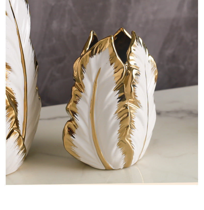 Luxury gold painted ceramic home decor piece by MC THE BLACK DIAMOND on a TV cabinet in a living room setting.