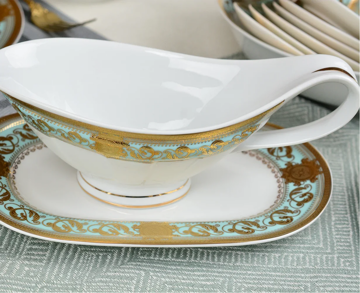 Elegant embossed gold porcelain dinnerware set by MC THE BLACK DIAMOND, featuring luxurious gold accents and intricate patterns.