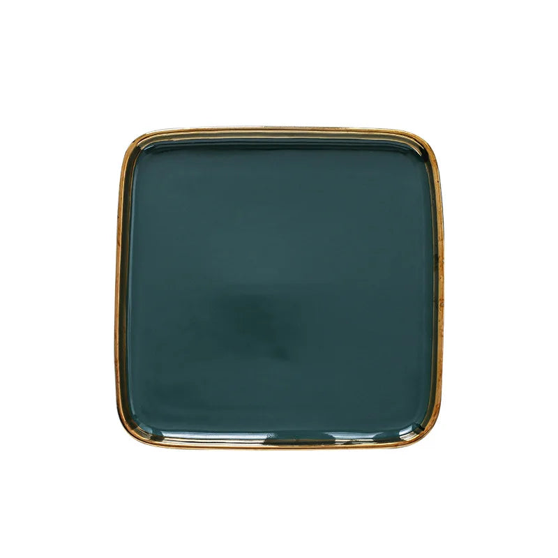 Dark green ceramic dinner plate with gold border from MC The Black Diamonds, ideal for steak, pasta, and dinner tableware.