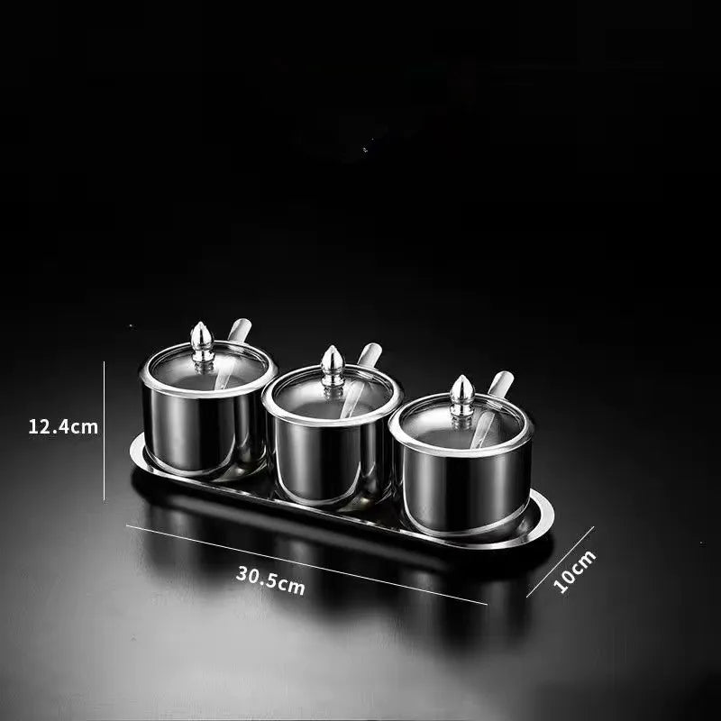 Golden seasoning box with glass cap, spoon, and flavoring tank from MC THE BLACK DIAMOND kitchen tools for spice storage.