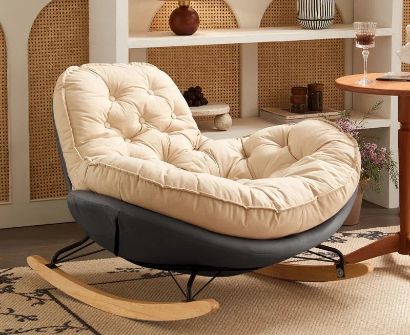 Comfortable MC THE BLACK DIAMOND chaise lounge chair in a modern home balcony setting with a cozy, Nordic-inspired design.
