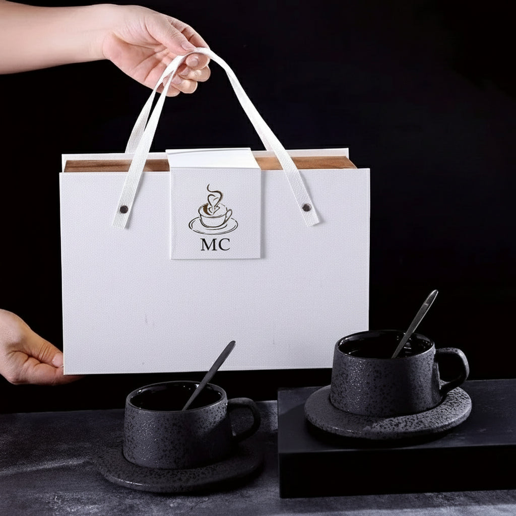 Ceramic black coffee cup with saucer, matching spoon and cup holder in a coffee and tea set by MC THE BLACK DIAMOND