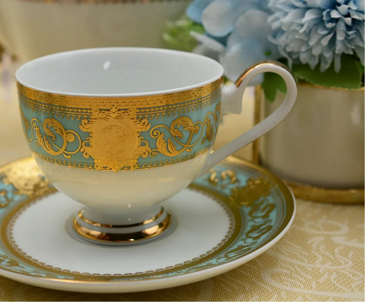Embossed gold porcelain dinnerware set by MC THE BLACK DIAMOND, luxurious plates and bowls with elegant gold embossed designs.