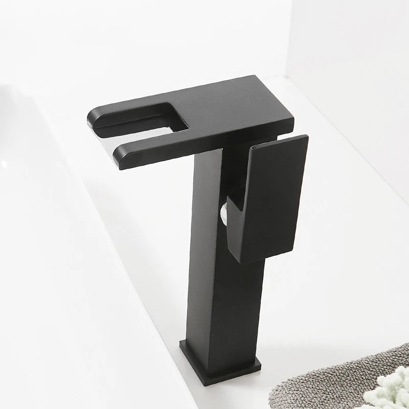 LED temperature-display basin faucet for bath sink by MC THE BLACK DIAMOND, showing sleek chrome finish with integrated temperature indicator.