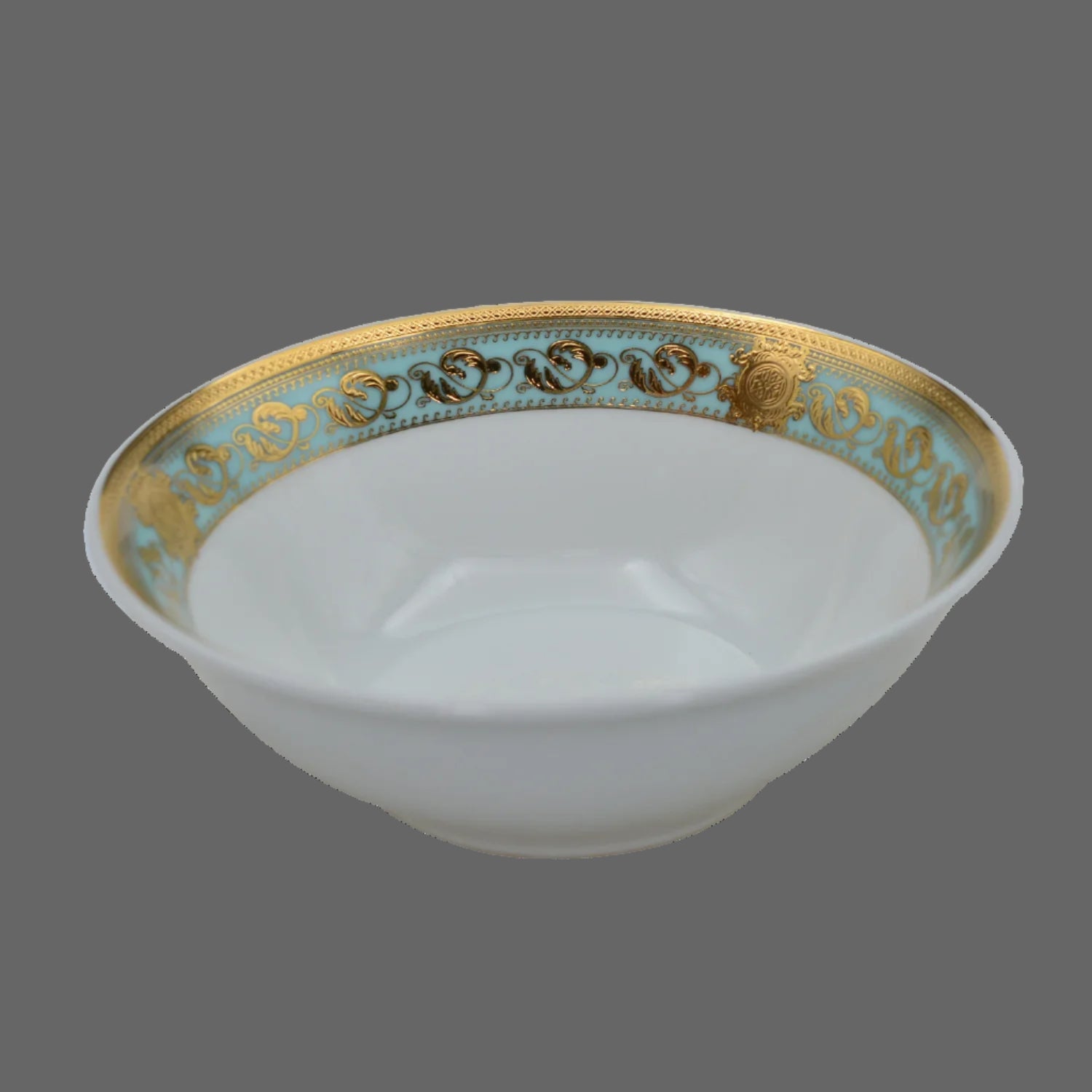 Elegant embossed gold porcelain dinnerware set by MC THE BLACK DIAMOND, featuring luxurious design and intricate detailing.