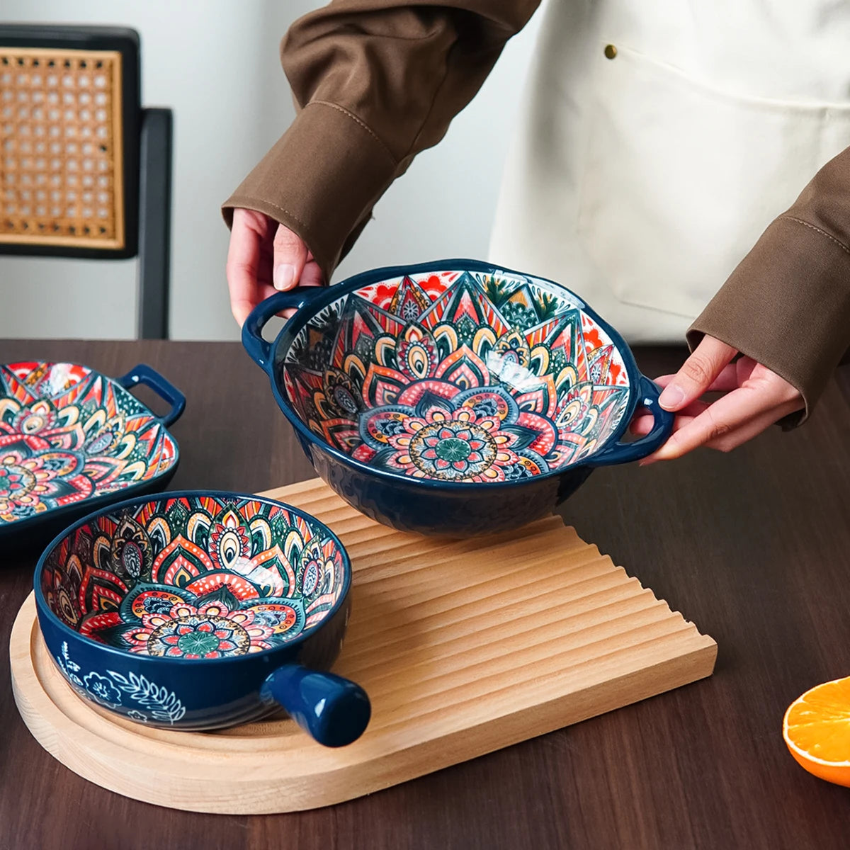Bohemian ceramic dinnerware set with unique floral pattern by MC THE BLACK DIAMOND, includes plates, bowls, and cups.