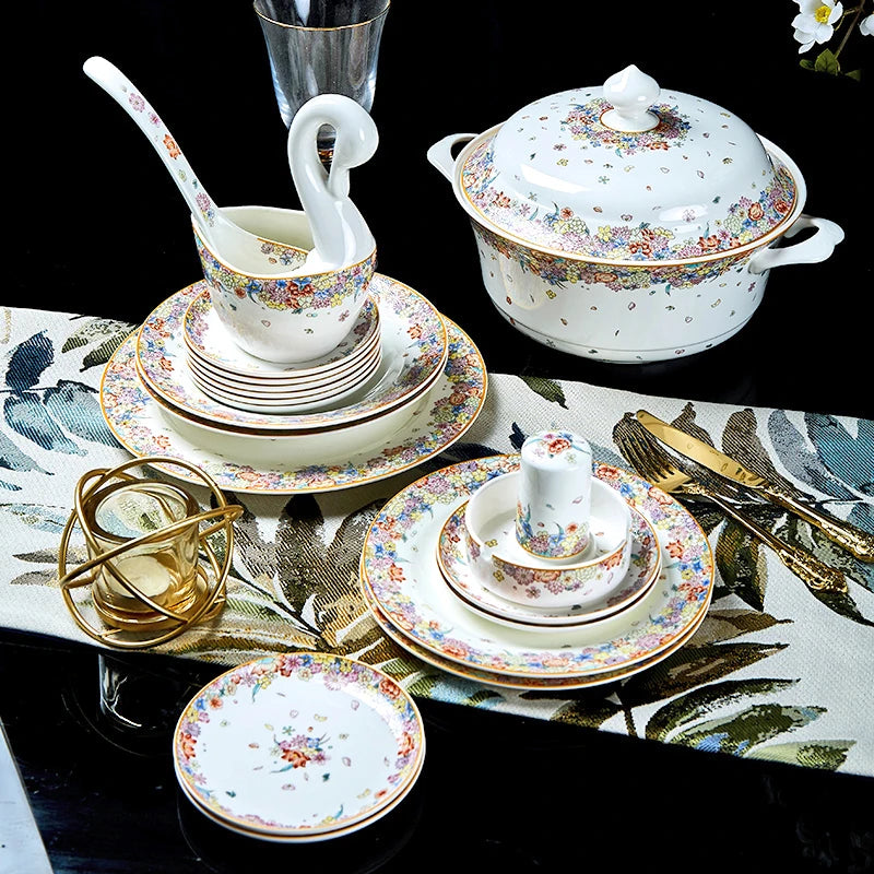 Family size dinnerware set with star design by MC THE BLACK DIAMOND, featuring plates, bowls, and mugs arranged on a table.