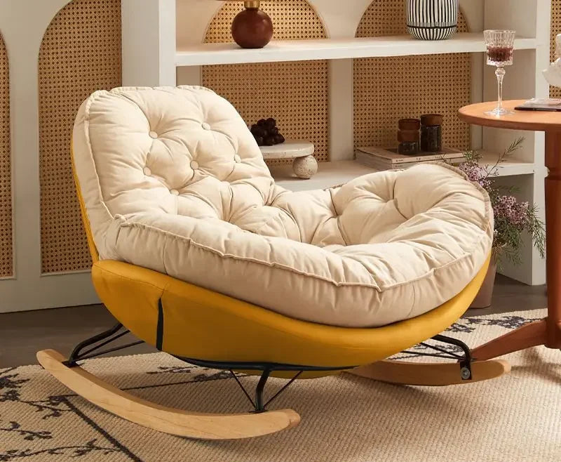 MC THE BLACK DIAMOND chaise lounge in a cozy home balcony setting, showcasing a stylish, comfortable Nordic-inspired rocking chair.