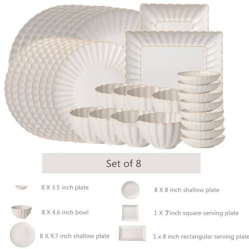 White Chrysanthemum shaped ceramic dinnerware set by MC THE BLACK DIAMOND, featuring elegant floral-designed plates and bowls.