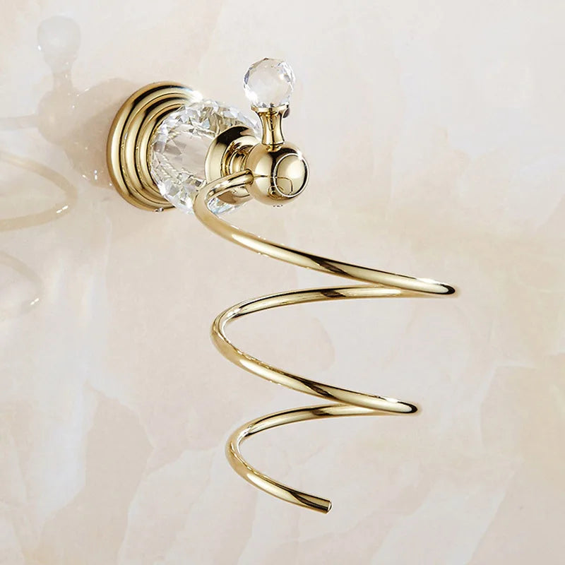 Luxury gold polished brass bathroom accessories set featuring soap dispenser, tumbler, and brush holder by MC THE BLACK DIAMOND