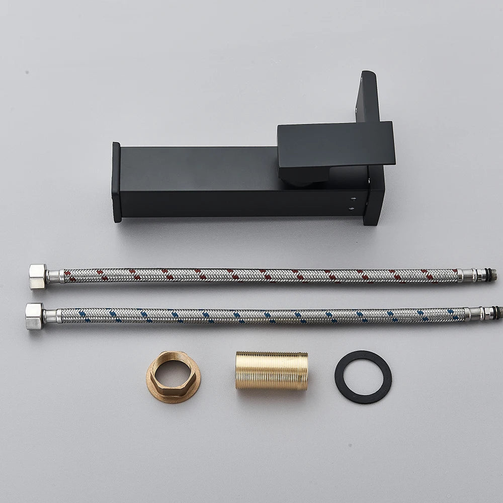 Black LED bathroom sink faucet by MC The Black Diamond, featuring brass waterfall design with hot and cold water mixer.