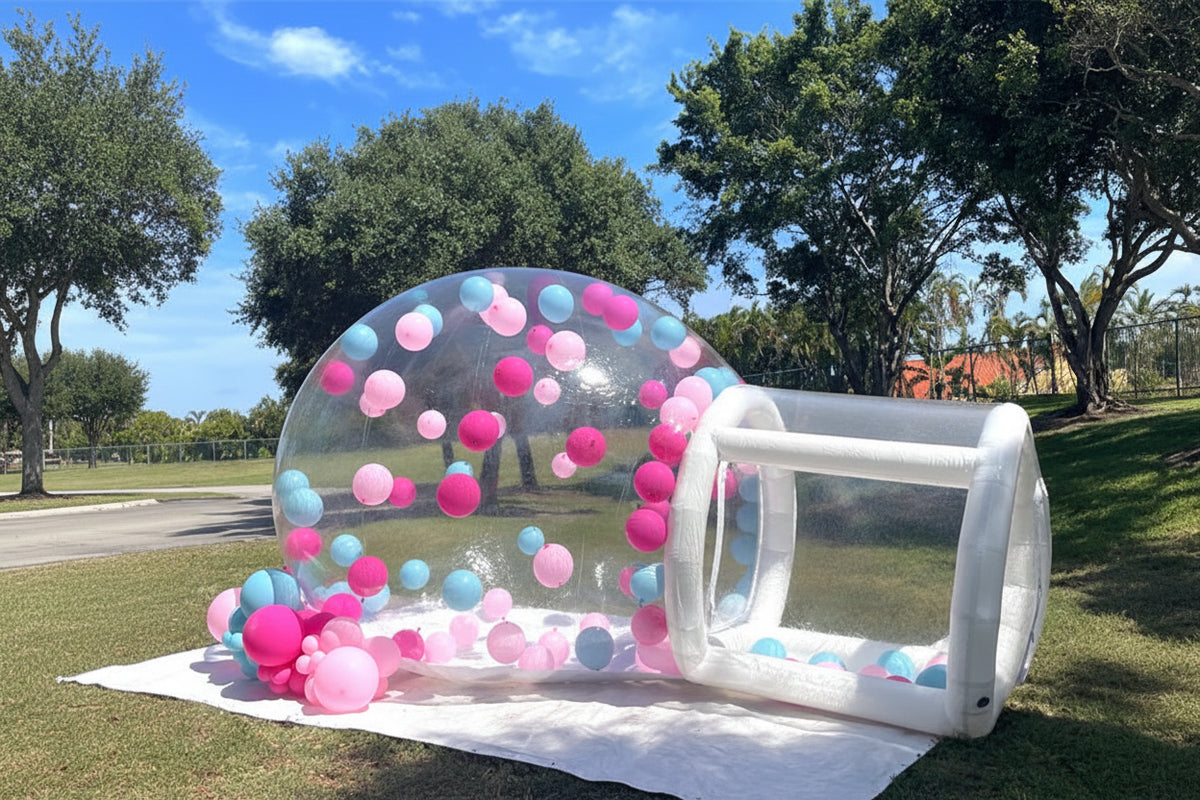Transparent inflatable crystal dome bubble room by MC THE BLACK DIAMOND, showing a clear, spherical inflatable bouncer structure.