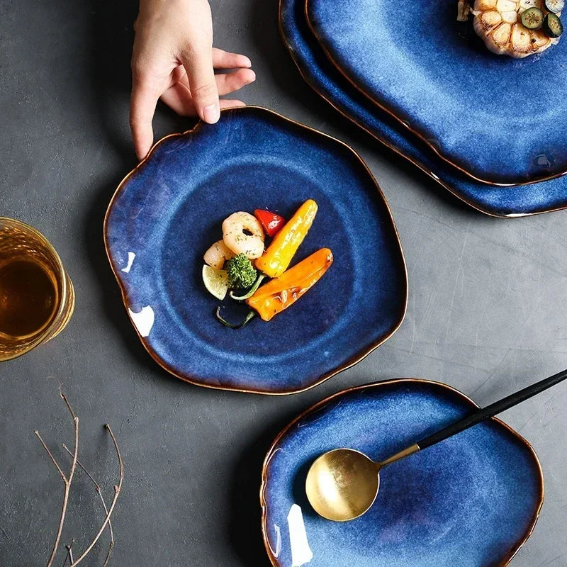 Elegant MC THE BLACK DIAMOND luxury dinnerware set with matching plates and bowls, showcasing sleek black and gold accents.