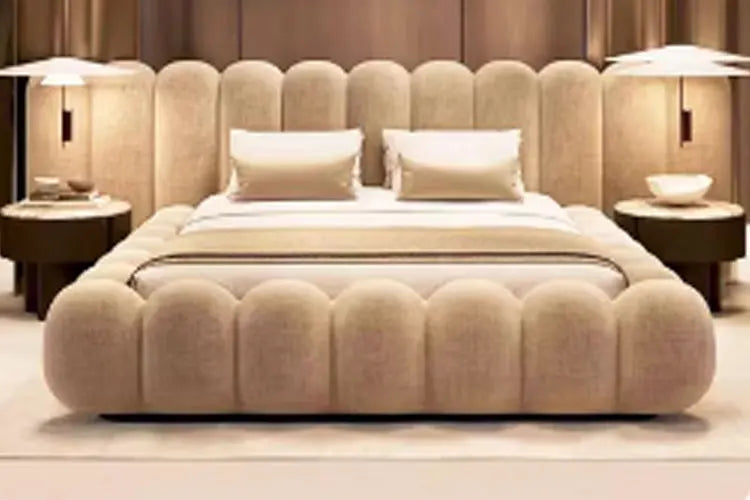 Large comfortable bed by MC THE BLACK DIAMOND with soft, cozy bedding and a stylish headboard in a modern bedroom setting.