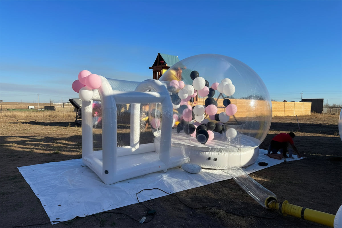 Transparent inflatable crystal dome bubble room by MC THE BLACK DIAMOND, showcasing the clear, spherical bounce structure and entrance.