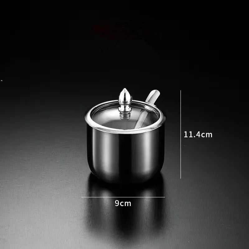 MC THE BLACK DIAMOND golden seasoning box with glass cap, spoon, and flavoring tank for kitchen use.