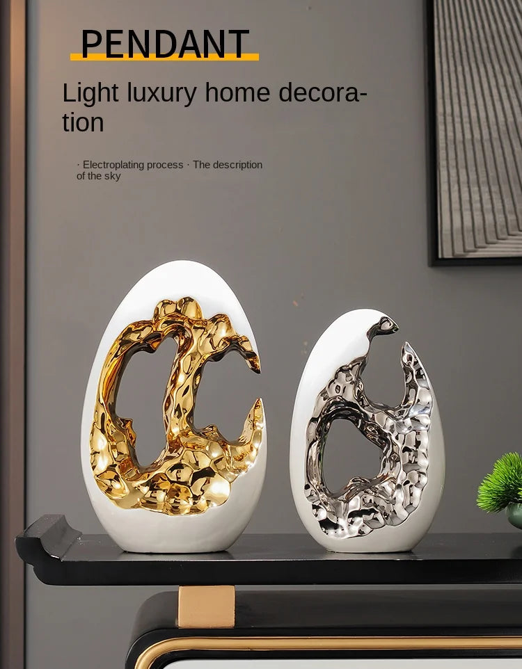 Gold figurines from MC THE BLACK DIAMOND decor collection displayed on a living room TV cabinet and office desktop.
