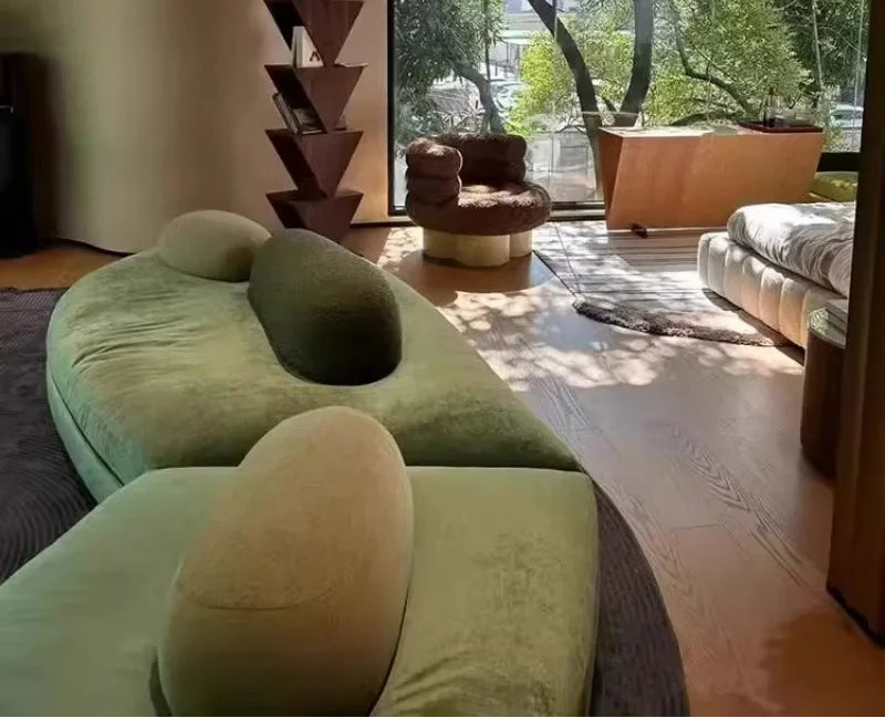 Large green fabric sectional sofa with flat layered design from MC THE BLACK DIAMOND, featuring special-shaped cushions and modern style.