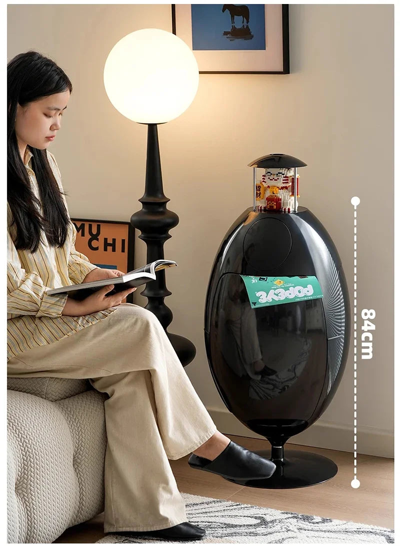 Large dinosaur egg design trash can by MC THE BLACK DIAMOND, plastic garbage collector with playful dinosaur egg appearance.