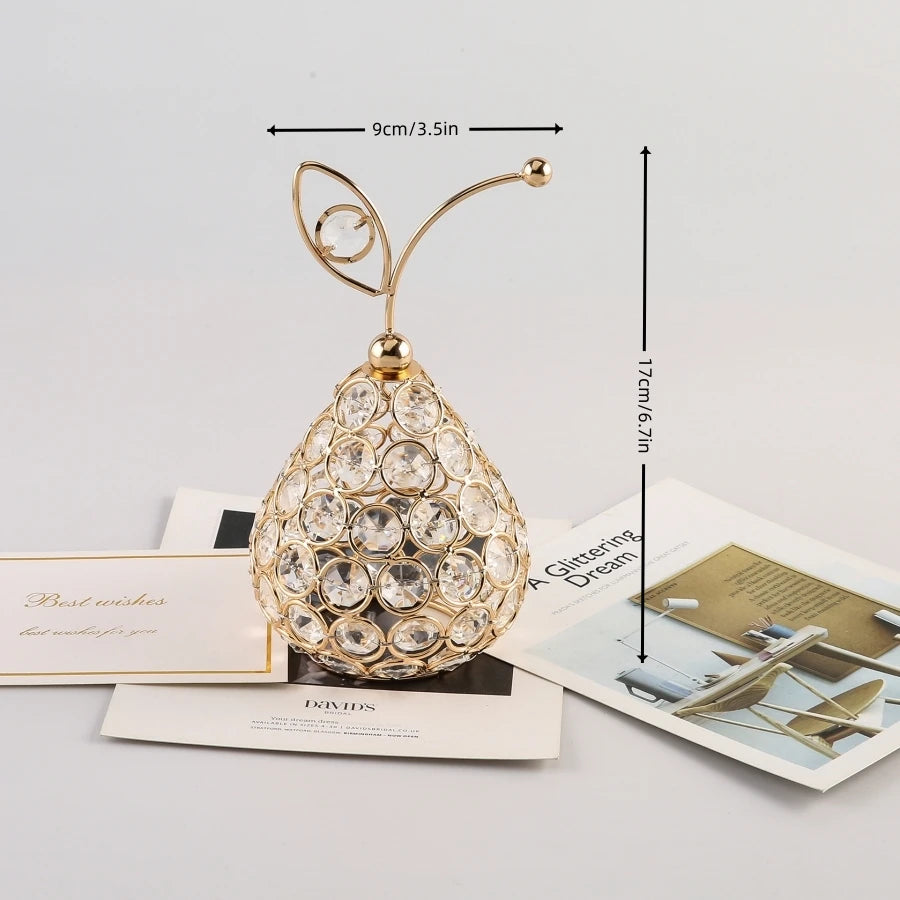 Gold crystal pineapple tabletop centerpiece for home decor by MC THE BLACK DIAMOND, featuring a shiny gold finish and crystal detailing.