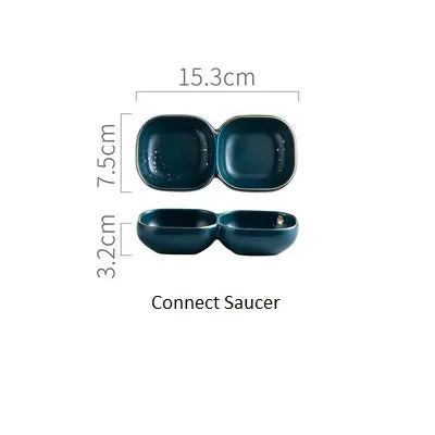 Dark green ceramic Western dinnerware set by MC THE BLACK DIAMOND, featuring plates and bowls arranged on a dining table.