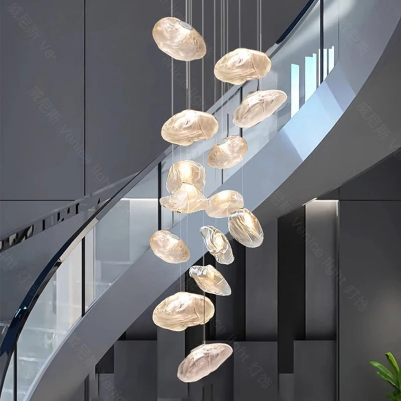 Modern MC THE BLACK DIAMOND crystal chandelier hanging in a stylish home, featuring multiple sparkling crystals and elegant lighting.
